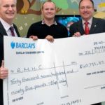 Shawn-Kevin-Handing-Over-Check-to-RMHC-in-Birmingham-.jpg